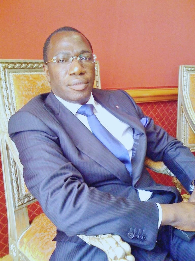 Mgr. El hadj Omar Bach — Founder & Managing Director